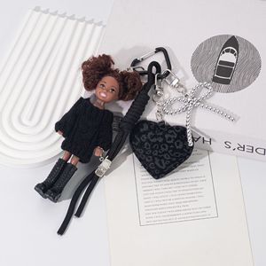 พวงกุญแจตุ๊กตาแฟชั่นสุดหรู HECION ตุ๊กตาเจ้าหญิงไฮยา เคลลี่ ผิวสีน้ำตาล สำหรับของเล่น เสื้อสเวตเตอร์สีดำ เคลลี่ พวงกุญแจ - Product Image 4