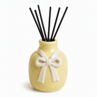 Bouteille diffuseur à roseaux en céramique rose personnalisée avec nœud, en porcelaine blanche crémeuse, pour huiles essentielles, flacon décoratif pour arômes et parfums, vente en gros