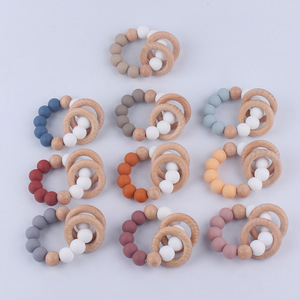 Bracelet de dentition en silicone et bois pour bébé, 0-24 mois, jouet doux unisexe - Product Image 1
