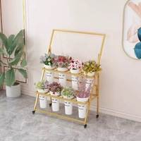 Présentoir de fleurs en acier de luxe avec éclairage mobile, seau en plastique et échelle légère pour décorations de Pâques en magasin