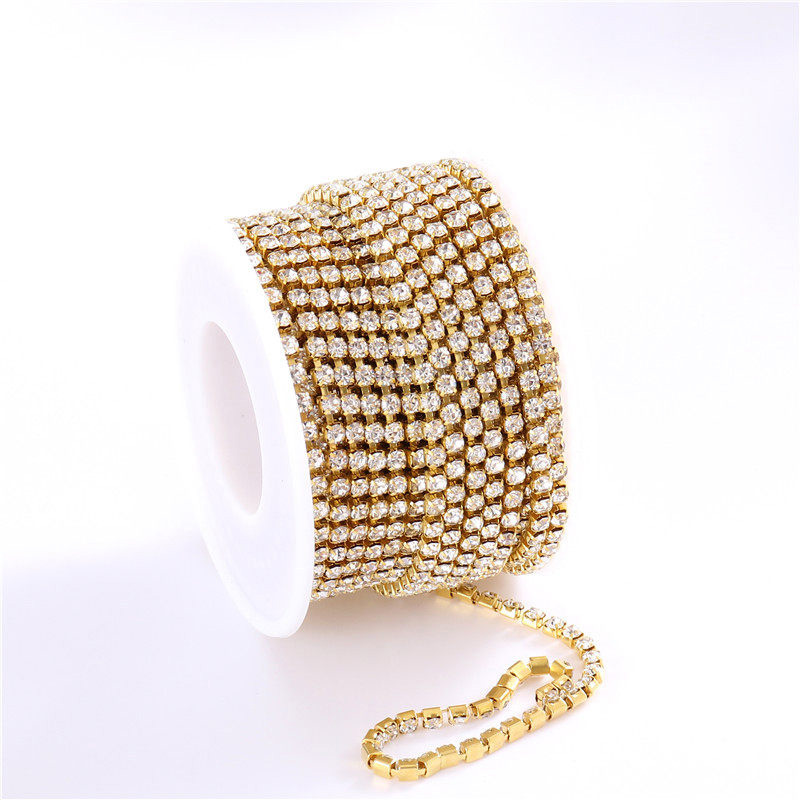 02 Oro + Pedrería Blanca 3mm