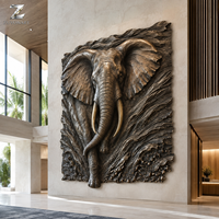 Sculpture murale en bronze d'éléphant, relief artisanal avec patine antique pour la décoration intérieure des hôtels, villas et salons