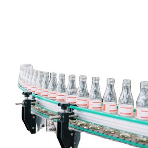 Ligne de production automatique de capsulage de boissons carbonatées de jus d'eau fluide pour bouteilles PET - Product Image 2