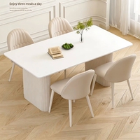 Ensemble de table à manger en pierre frittée style crème, table à manger rectangulaire de luxe simple et chaises assorties pour les petits foyers