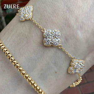 Glänzendes Silber- & Goldplattiertes Liebes-Kupferarmband mit Vierblättrigem Kleeblatt-Anhänger, Süßer Blumenstil-Charm, Feines Moissanit-Armband für Damen - Product Image 1