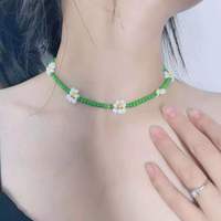 Extrêmement populaire bohème fait à la main tressé perlé clavicule chaîne mignon multicolore marguerite fleur collier cadeaux pour les femmes