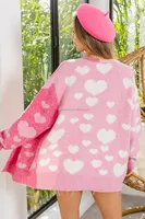 Cardigan à manches longues en tricot avec cœur pour la Saint-Valentin coupe ample rose coloré ouvert pull pour femmes avec poches