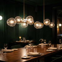 Lampe suspendue horizontale élégante et créative en verre transparent à bulles