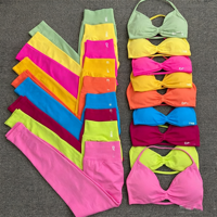 Ensemble de yoga et de fitness personnalisé pour femmes, respirant, uni, sans couture, en spandex/nylon, soutien-gorge de sport et short, effet push-up, ensemble de vêtements de sport 2 pièces