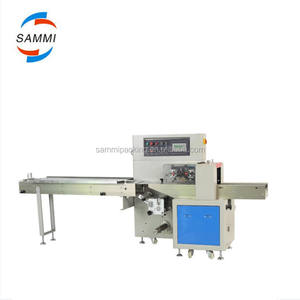 Machine à emballer automatique économique et pratique d'oreiller de barre de chocolat de bonbon dur cassant d'arachide avec la grande remise - Product Image 1