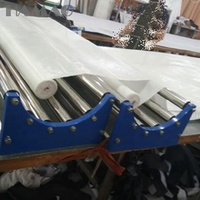 Machine de découpe industrielle manuelle en acier inoxydable avec support de déroulement de tissu 220V pour l'habillement et le cuir