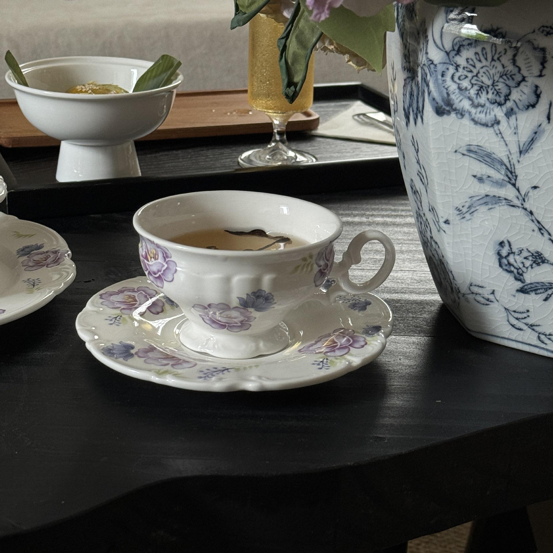 Purple floral cups and plates