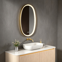 Espejo de Baño Largo Ovalado con Marco Dorado, LED Inteligente Antivaho, Retroiluminado, Espejo de Vanidad de Pared para Proyectos Residenciales y Hoteles