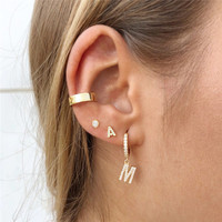 CANNER Boucles d'oreilles asymétriques en argent sterling S925 avec initiale simple A-Z sertie de diamants