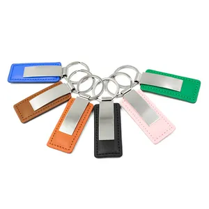 سلسلة مفاتيح فارغة بتصميم مخصص للبيع بالجملة من الصين تحمل اسم أو اسم الشركة سلسلة مفاتيح معدنية من الجلد الأسود شعار العلامة التجارية