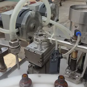 Machine automatique de remplissage et de bouchage de crème liquide d'huile de parfum de bouteille en verre à bas prix