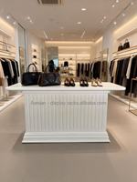 Table de présentation en bois peint blanc durable pour boutique de vêtements, magasin de sacs
