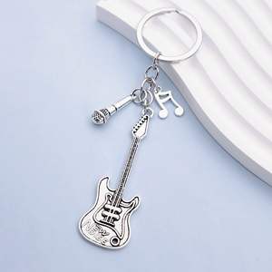 <span class=keywords><strong>Instrument</strong></span> de <span class=keywords><strong>musique</strong></span> créatif pendentif événement <span class=keywords><strong>cadeau</strong></span> sac pendentif métal laque guitare <span class=keywords><strong>porte</strong></span>-clés - Product Image 2