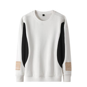 Camisetas de moda para hombres jóvenes, camisetas informales de otoño e invierno con colores sólidos y corte holgado, finas y de cuello redondo. - Product Image 1