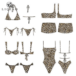 مجموعة ملابس سباحة من قطعتين بتصميم هالتر بلونين (أسود ونمر) مع حمالة صدر مبطنة - Product Image 2