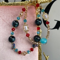 Colgante de cruz con pavé de cristales, accesorio para bolso/cadena de teléfono con diamantes de imitación en forma de lágrima en tono dorado, estilo gótico industrial pesado