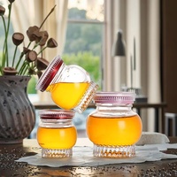 Pot de miel en verre en stock Cadeau de mariage de haute qualité Pot de confiture en verre créatif avec couvercle Récipient hermétique