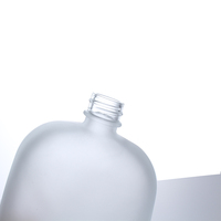 Vente en gros de flacon plat bouteille givrée de 100ml 250ml 500ml boisson thé infusion froide café jus bouteille en verre avec couvercle à vis