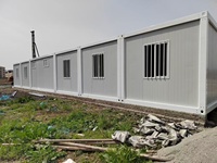 Conteneur modulaire démontable en panneaux sandwich d'acier STC 20FT 40FT pour entrepôt et garage au design moderne