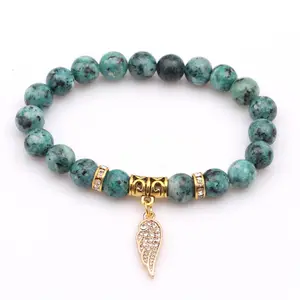 <span class=keywords><strong>Bracciale</strong></span> da uomo con perline in pietra rossa blu naturale con ciondolo ad ala d'angelo in rame con zirconi da donna - Product Image 1