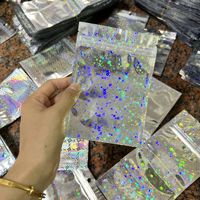 Bolsa de plástico con cierre de cremallera y holograma de papel de aluminio, bolsa de Mylar para alimentos con láser de estrella, bolsas de pie a prueba de agua con olor, accesorio de almacenamiento