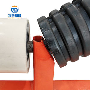 Industriële transportband met impactrollen, rubberen schijven en looprollen voor zwaar materiaal in laadzones. - Product Image 2