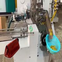 Machine d'emballage en aluminium de style enveloppe pour chocolat en forme de triangle, avec distribution de colle, haute vitesse, entièrement automatisée, personnalisée