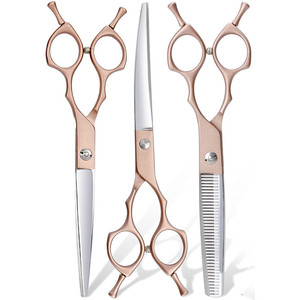 Tijeras de peluquería para mascotas en oro rosa, acero inoxidable, hoja curva de 6.0 pulgadas con dientes para recortar el pelo de perros. - Product Image 1