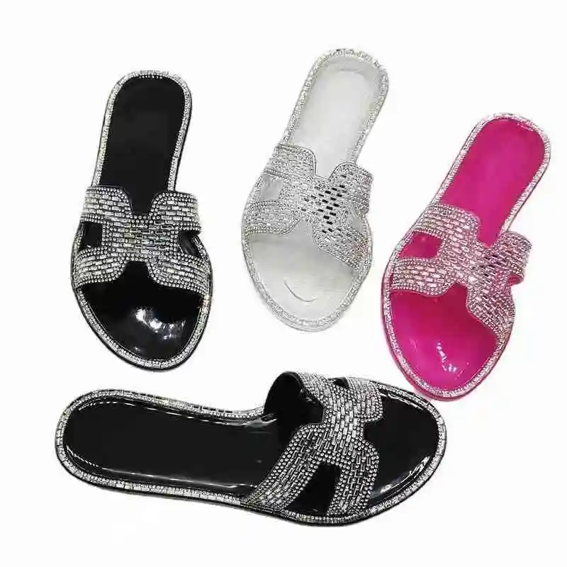 Estate 2021 all'ingrosso della fabbrica H strass pistoni delle signore trasparente sandalo diamante slip on scarpe piane della gelatina calzature casual