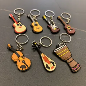 Móc Khóa Nhạc Cụ Mini Sáng Tạo Móc Chìa Khóa Kèn Saxophone Đàn Guitar Bằng Silicon Dễ Thương Ba Lô Đồ Trang Trí Xe Hơi