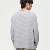 T-shirt rayé à manches longues pour homme, style streetwear américain, nouvelle collection automne, coupe décontractée avec col rond ample
