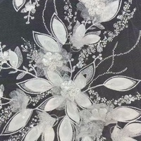 Tissu en dentelle suisse brodé de fleurs 3D en sequins perlés de haute qualité personnalisé pour robe