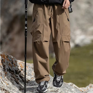 Deportes al aire libre Hombres Repelente al agua A prueba de viento Tres pruebas Trekking Pantalones de moda Montañismo Bolsillos grandes Pantalones de carga - Product Image 1