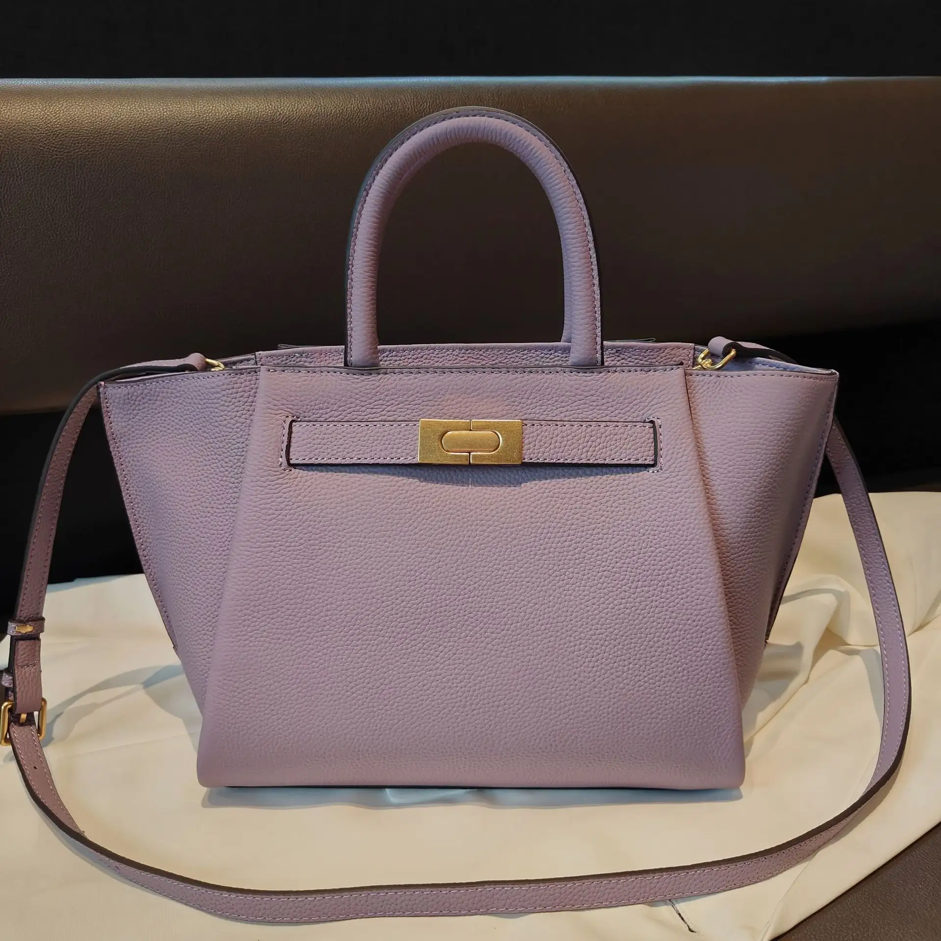 Nuevo modelo novedad hermosa mujer clásica Color púrpura monederos bolsos de mano bolso de moda de cuero genuino 2024