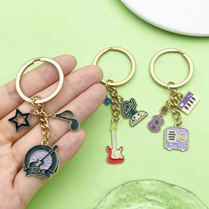 Nuevo Llavero de Moda 2025 con Colgante de Notas Musicales de Guitarra y Piano, Accesorio para Llaves de Bolsa - Product Image 3