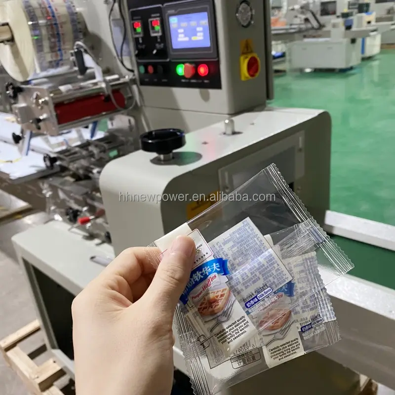 बेकरी कैंडी तकिया बैग पैकिंग मशीन की कीमत के लिए स्वचालित क्षैतिज प्रवाह रैपर मशीन फ्लो रैप रैपिंग पैकेजिंग मशीन
