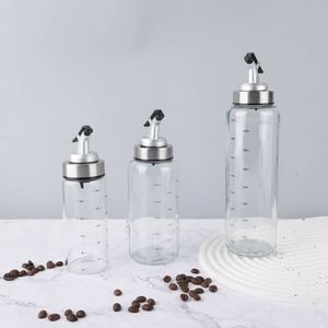 Distributeur d'huile en verre borosilicate de qualité alimentaire avec couvercle - Bouteille d'huile de cuisine résistante à la chaleur et anti-fuite pour la cuisson - Product Image 1
