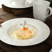 Service de vaisselle en céramique blanche à motifs floraux en relief, assiettes, bols, tasses pour la maison, les restaurants, les traiteurs, les fêtes, les mariages et l'usage quotidien