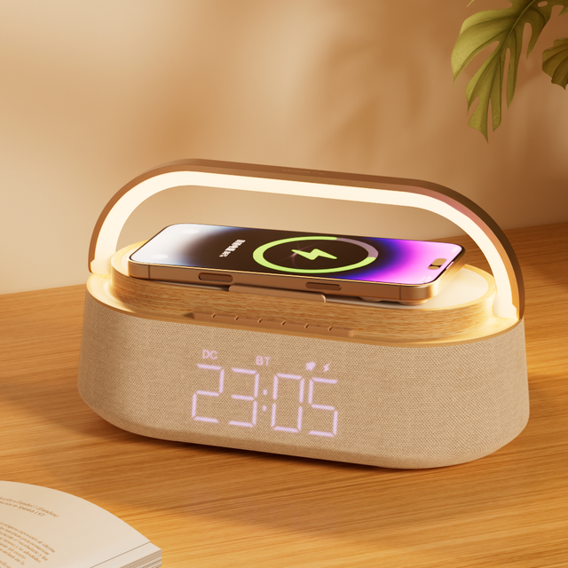 KUANGXIANG Modern Smart Wake-up Center Electronic Alarm Clock with Wireless Charger BT Speaker Ambient Light FM Radio Phone Dock