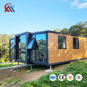 Maison conteneur méditerranéenne moderne compacte et extensible de 20 pieds avec <span class=keywords><strong>chambre</strong></span> et salon pour petite famille, idéale comme <span class=keywords><strong>chambre</strong></span> <span class=keywords><strong>d</strong></span>'amis dans un jardin. - Product Image 1