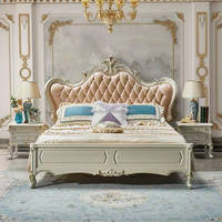 Lit de luxe antique européen capitonné en cuir de première qualité avec cadre en bois blanc ivoire, ensemble de meubles de chambre royale