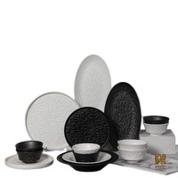 Ensemble de bols et assiettes haut de gamme en céramique noir et blanc de style japonais, export transfrontalier, assiettes à steak de style occidental