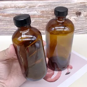 Grosir 60Ml 250Ml 500Ml Botol Boston Kaca Amber untuk Kosmetik Minyak Serum Minyak Buluh dengan Rantai Suplai Tutup Sekrup Plastik