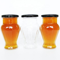 Bouteilles en verre transparentes en forme de V de 212 ml (7 oz) de qualité supérieure et abordables avec bouchons en fer blanc noir pour sauces, miel, aliments, épices, remplissage à chaud