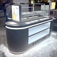 Rak Display Kosmetik Ramah Lingkungan dari Baja Anti Karat dengan Logo Custom, Tahan Lama, Lampu LED, dan Bagian Belakang Kaca untuk Ritel Makeup dan Skincare